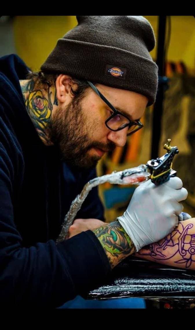 Cam West, from Living Skin Tattoo’s website