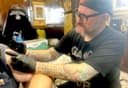 Mad Max Wallace, from Top hat Tattoo and Top Hat Barber Shop’s website