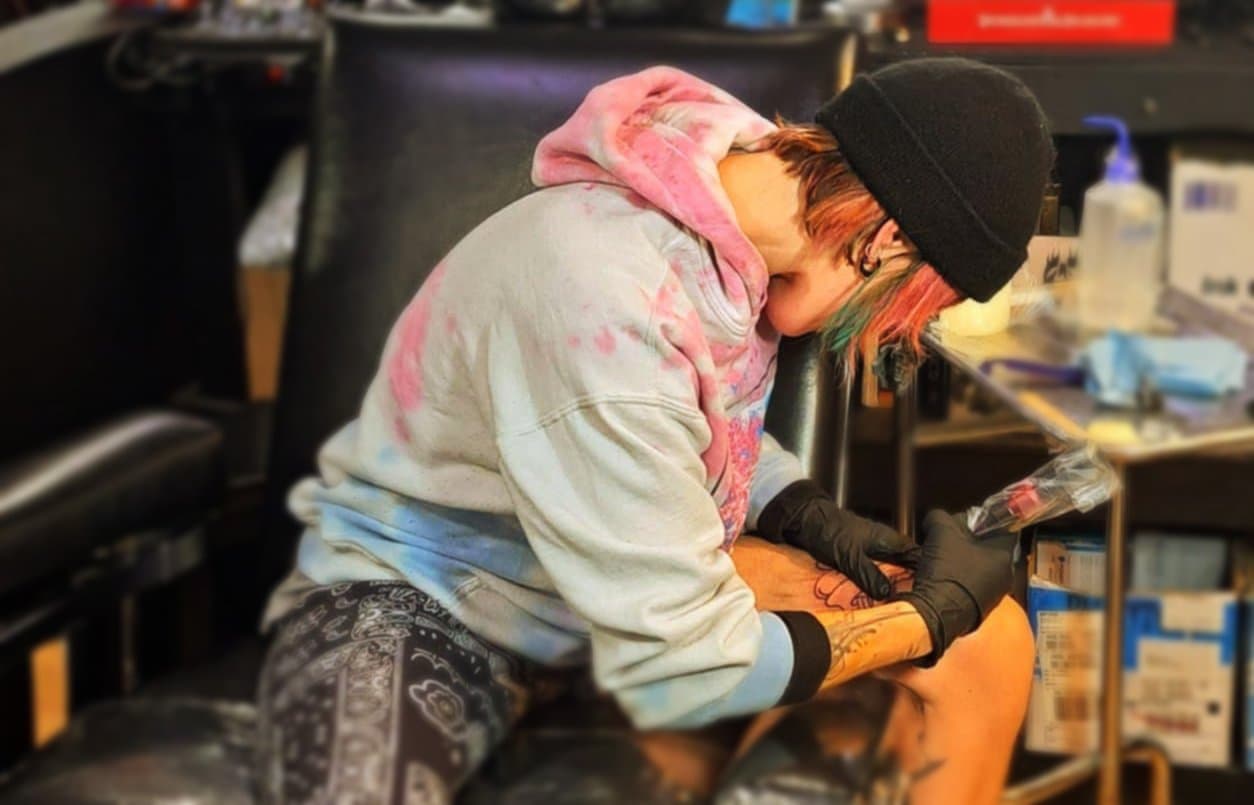 Alyx Franz, from The Missing Piece Tattoo Lounge’s website