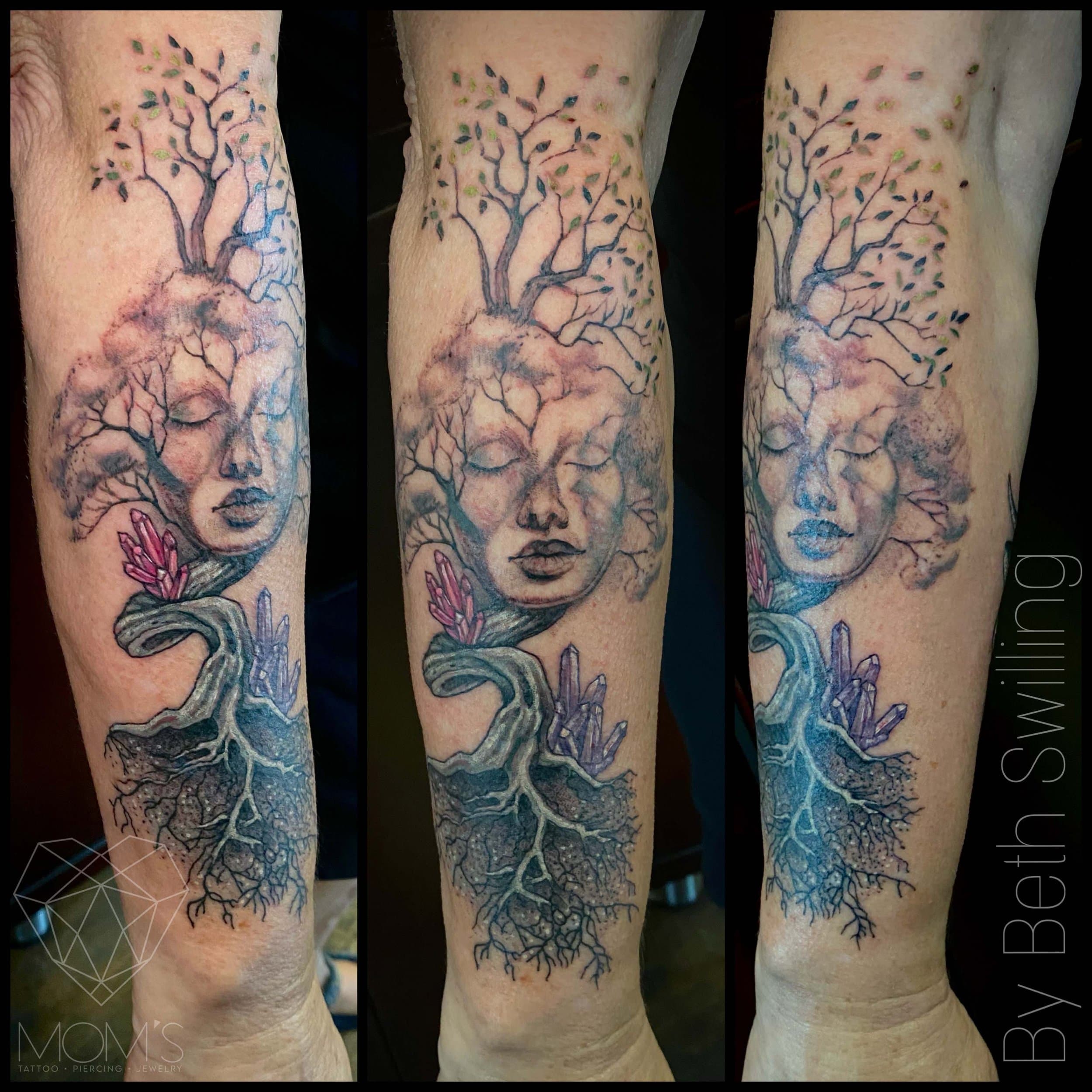 Beth Swilling, from Mom's Custom Tattoo & Body Piercing’s website
