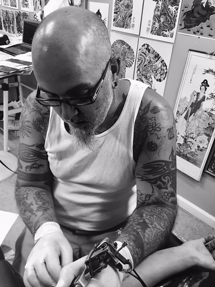 Jake Robbins, from Lucky Dragon Tattoo Parlor’s website